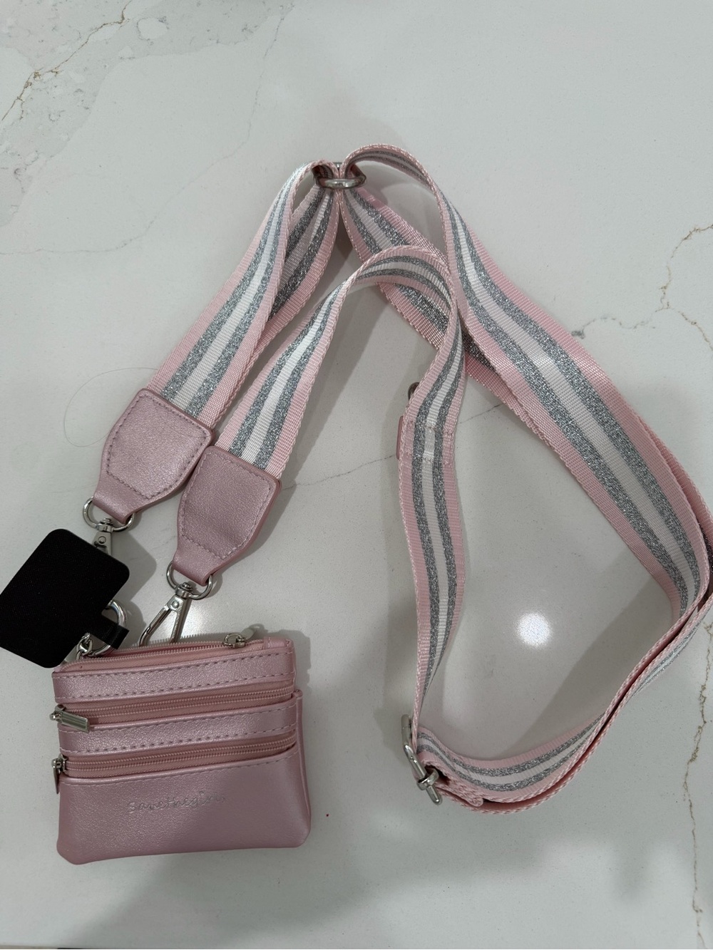Save the Girls Pink Crossbody Pouch with Striped Strap for phone.  Never used.